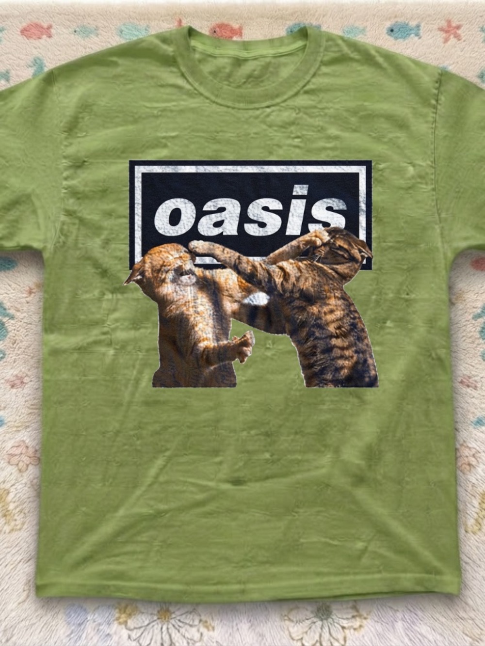 Oasis kiwi Tee with Fighting Cats Graphic